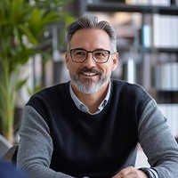 Middle-aged man at job interview wearing dentures