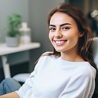 Woman smiling at her dentist’s appointment