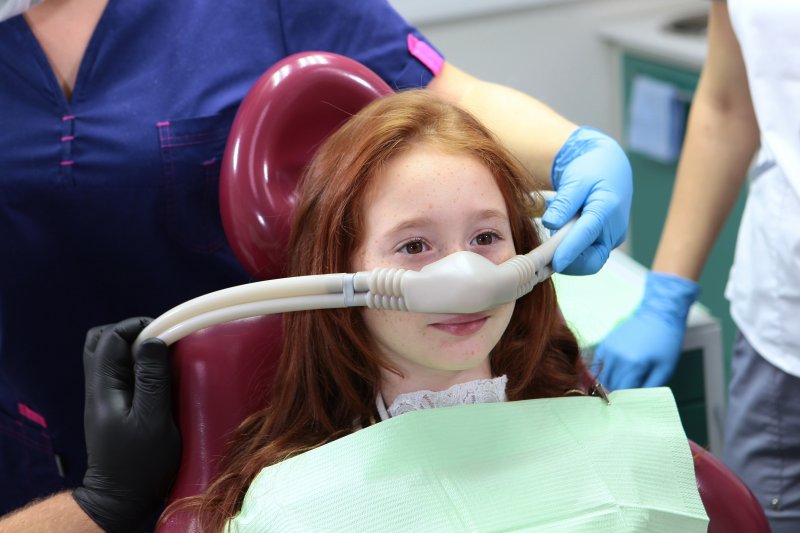 young girl receiving nitrous oxide